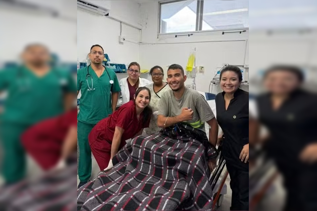 Jovem que desapareceu no Pico Paraná posa para foto com médicos